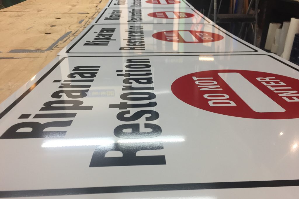 Solid aluminum and cut vinyl signs